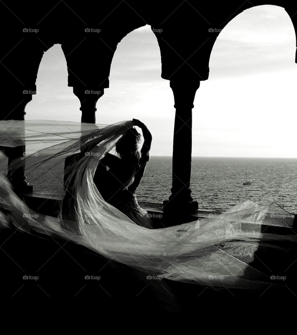 Surreal dance... photo shoot for a wedding ... tooked with my phone when the wind has lifted the veil transforming the bride in a dancer.