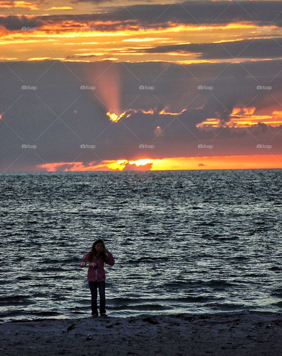 Girl in sunset