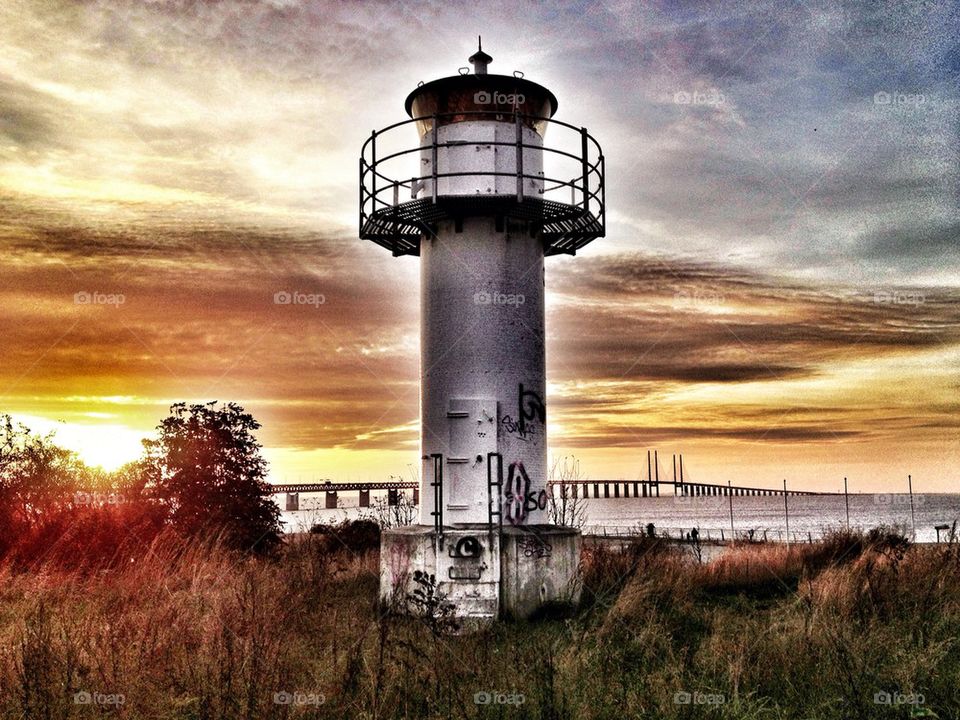 Light House with bridge in the distance