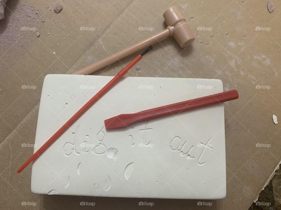 Digging out dinosaur fossils 