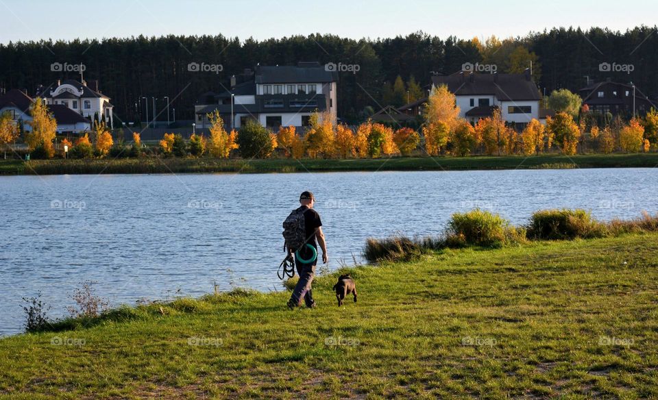 beautiful countryside nature landscape men walking with dog