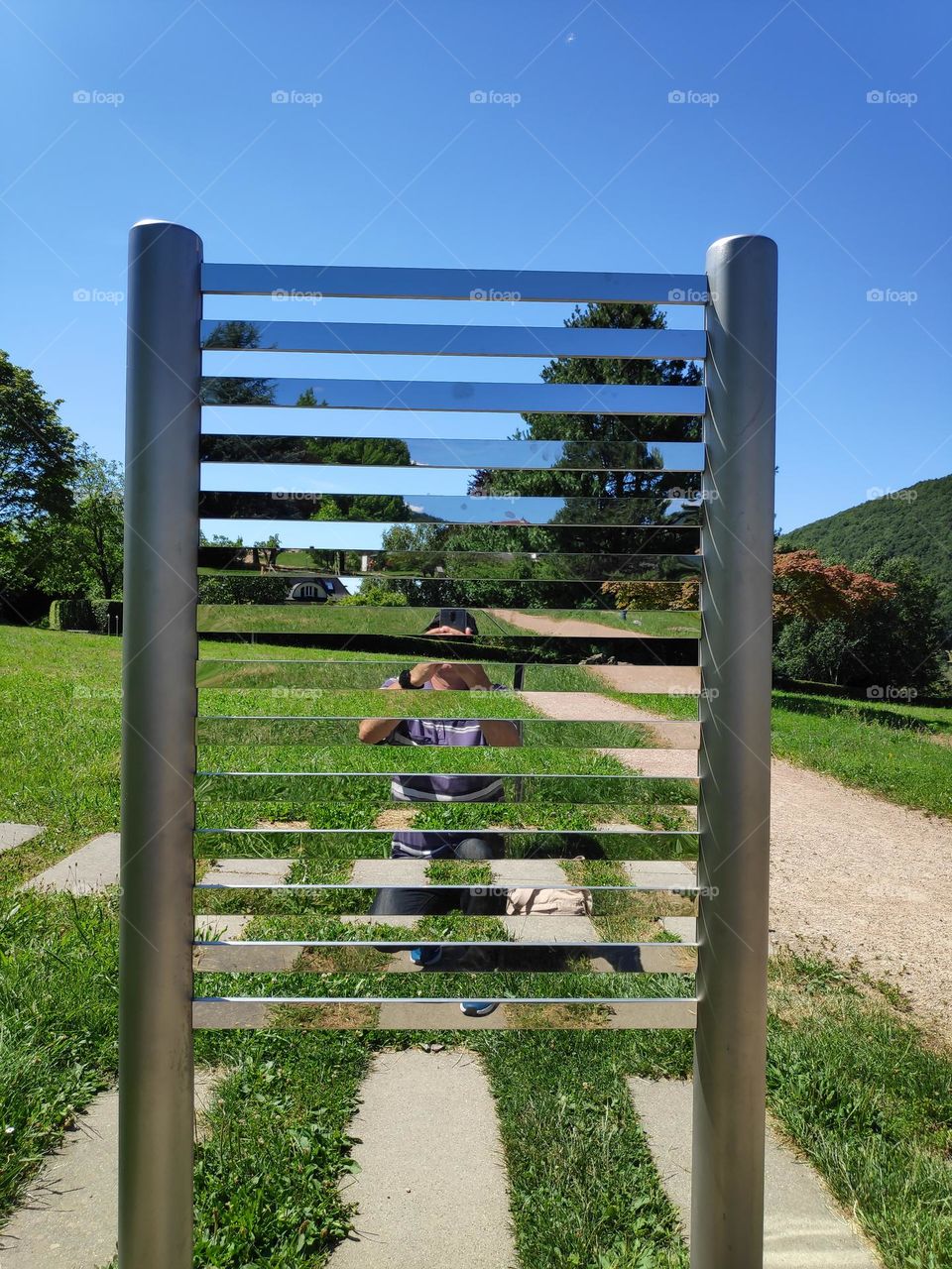 Optical effect with mirror slats