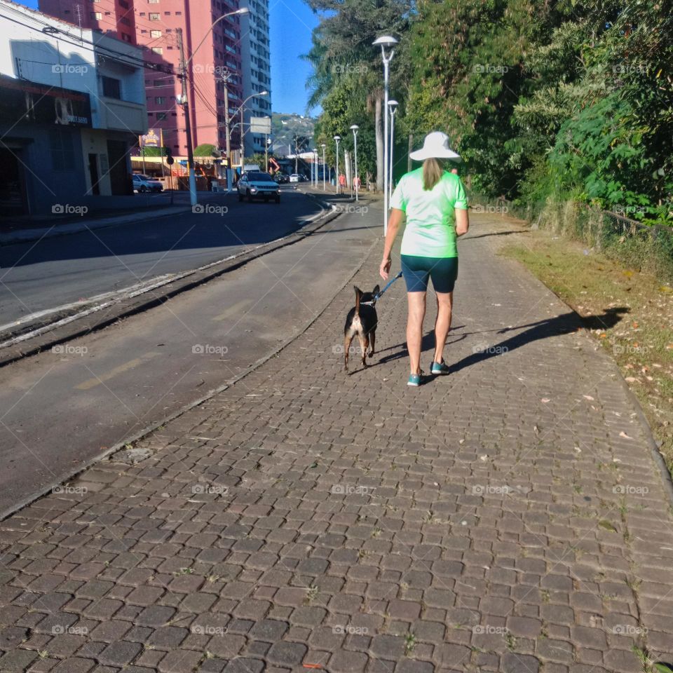A morning walk with her dog