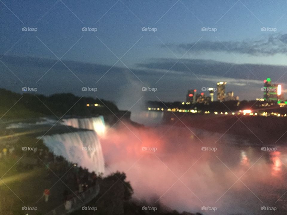 Falls at dusk with lights