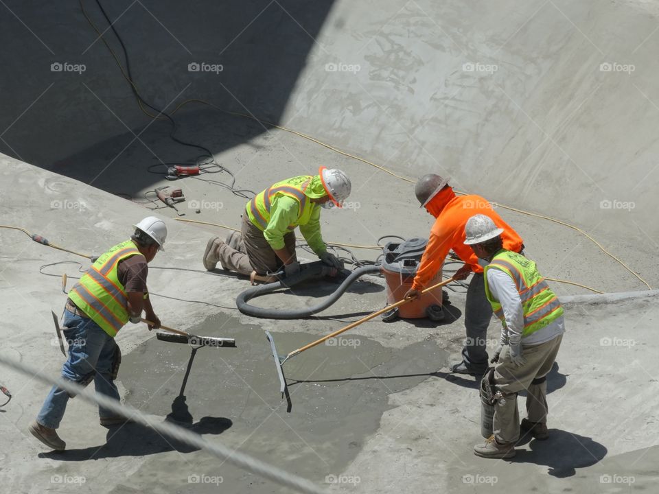 Municipal Workers At A Building Site