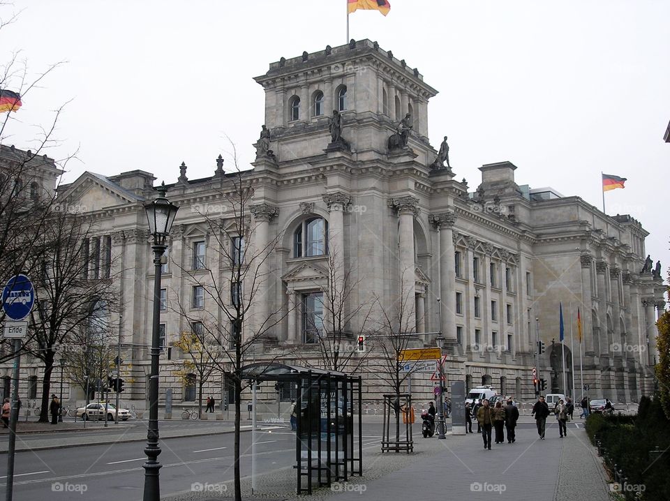 Building on a street in Berlin with flags