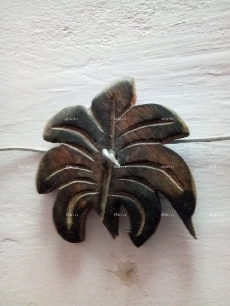 Old designed keys hanger made of wood.