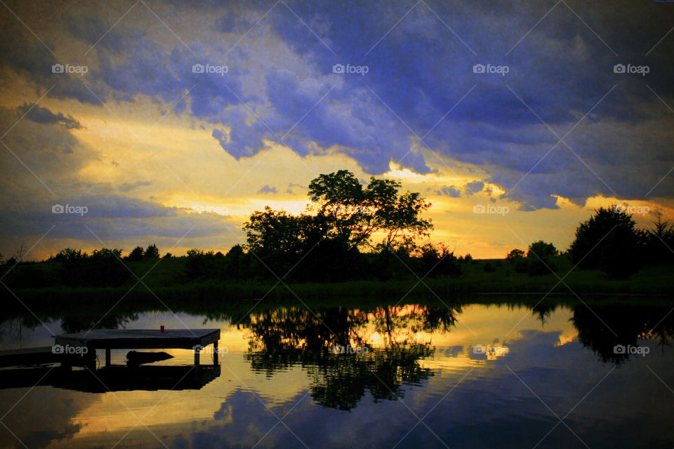 Nebraska at dust. this is one of my favorite pictures ever taken. Lincoln, Nebraska in the summer. a quiet pond at dusk.