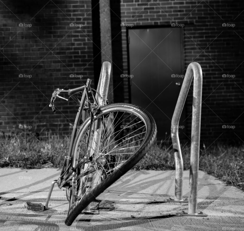 A damaged bike still locked up