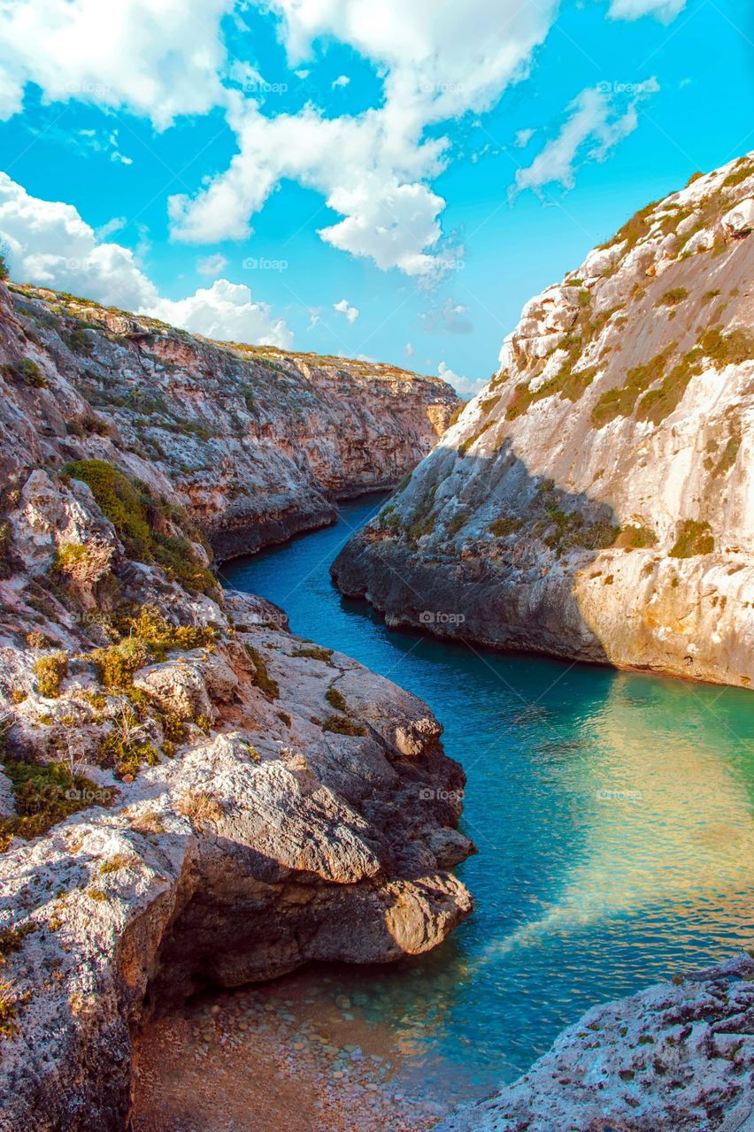 The azure waters of the valley known as Wied il-Ghasri in Gozo, Malta’s sister island. 