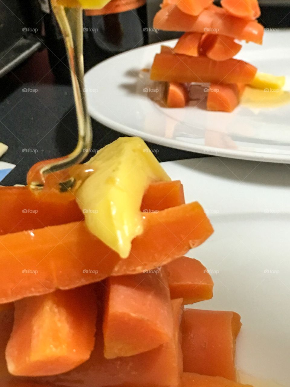 Steamed honey carrot stacks plating  food presentation