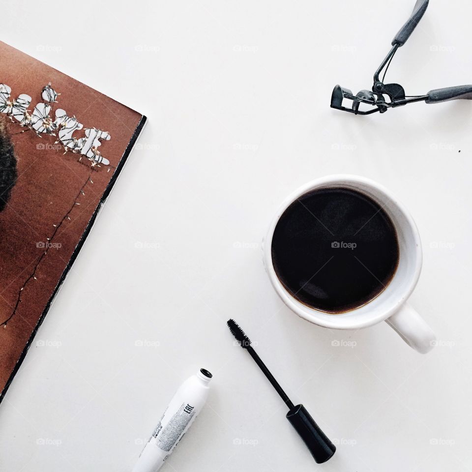 High angle view of coffee with mascara