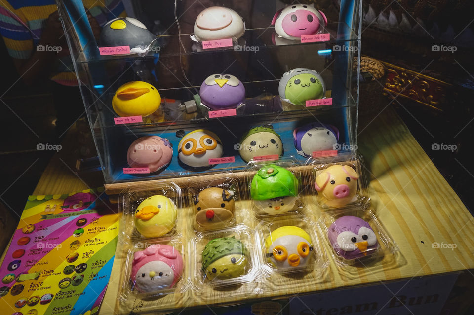 Cute little character dumplings/bao at a Thai Market. Each one has a different filling.