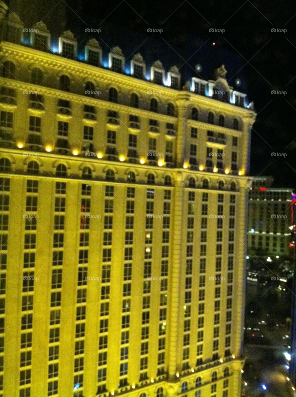 A hotel in the Las Vegas Strip is nicely lit at nighttime. 