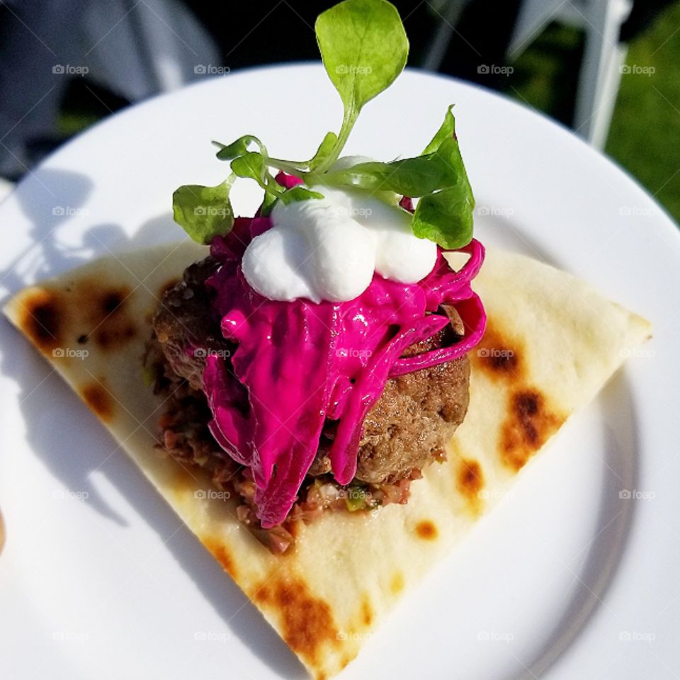Lamb meat with beets on a pita, so delicious.