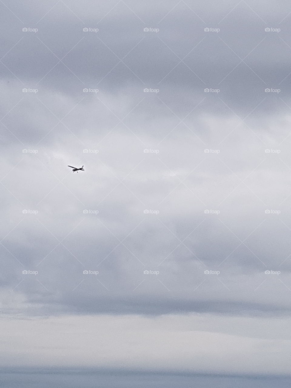 a plane flying on the sky