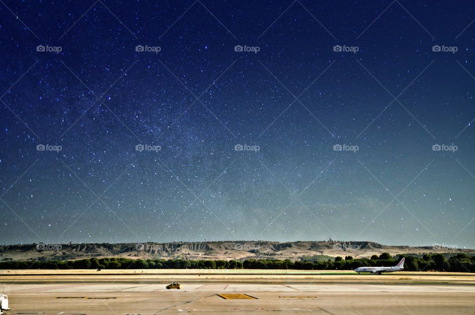 Airport strip with mountain view and beautiful sky effect