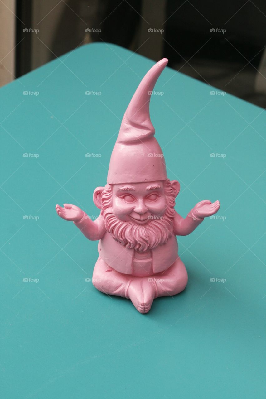 Wrocław has a new dwarf! He's pink and he's practising yoga. Any idea, where he resides?