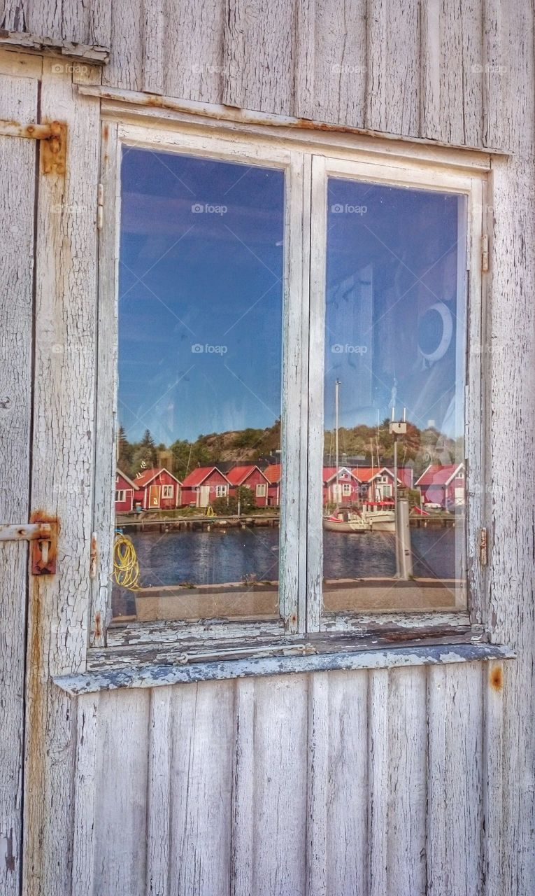 landscape reflection in window. landscape reflection in window