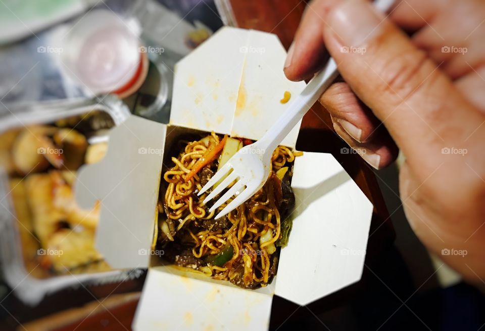 Person with veg noodles