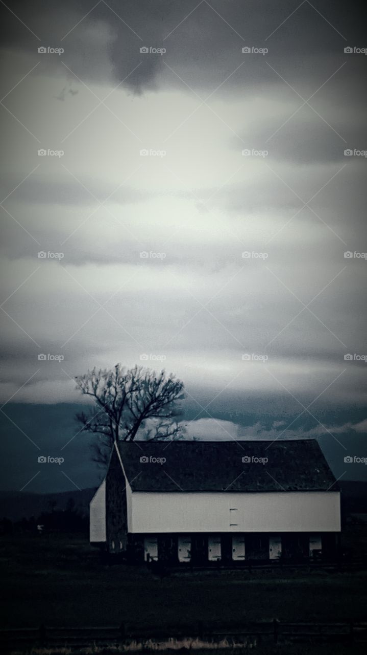 storm clouds over the barn