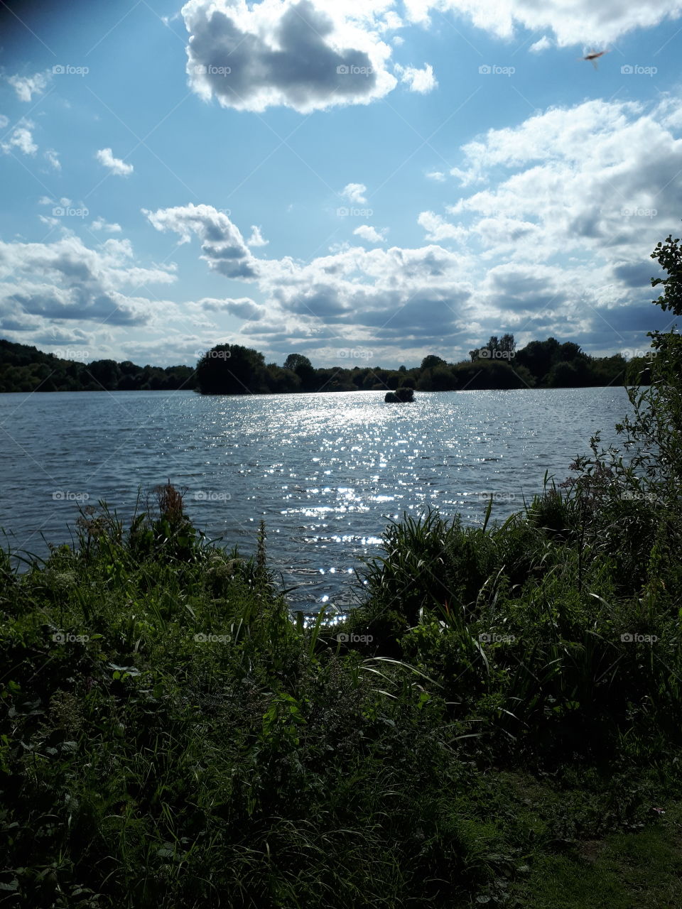 Clouds Above A Lake