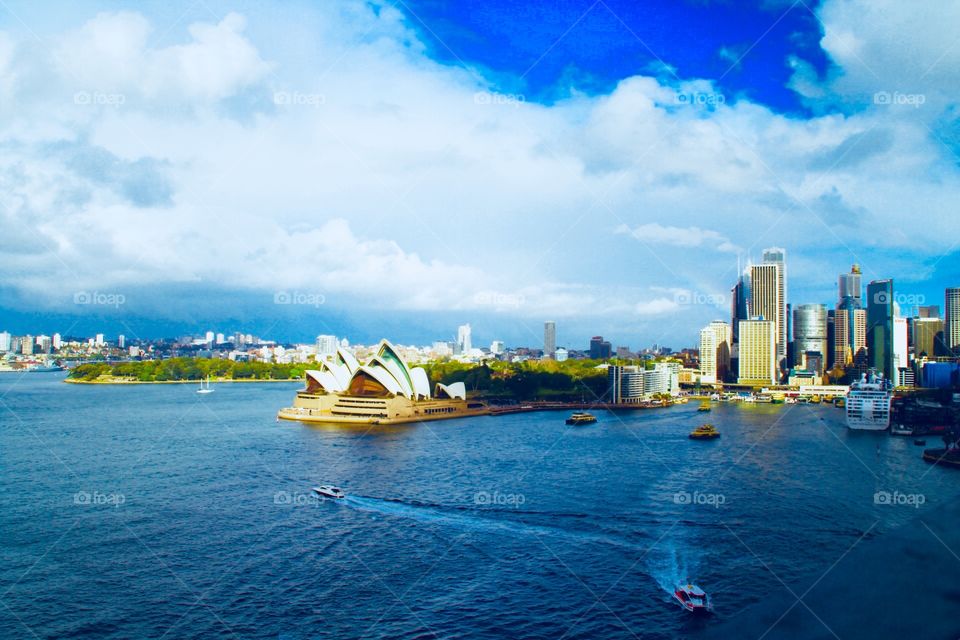 Overlooking Sydney opera house and Sydney city on the Sydney harbour bridge 