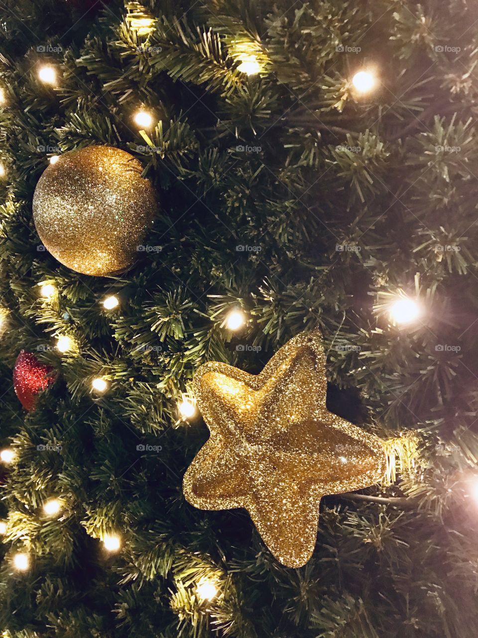 Golden decorations on a christmas tree