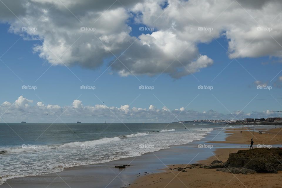 clouds over the beach