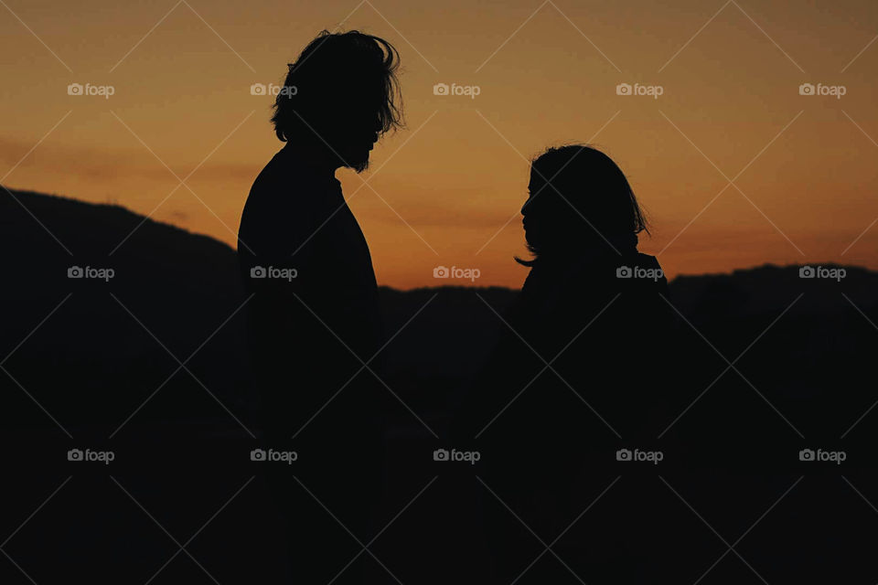 Silhouette of a man and a woman.