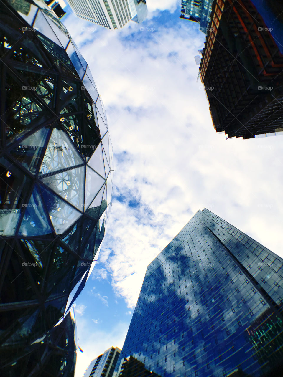 Three building stand together, different shape, material or purpose but still strong  !