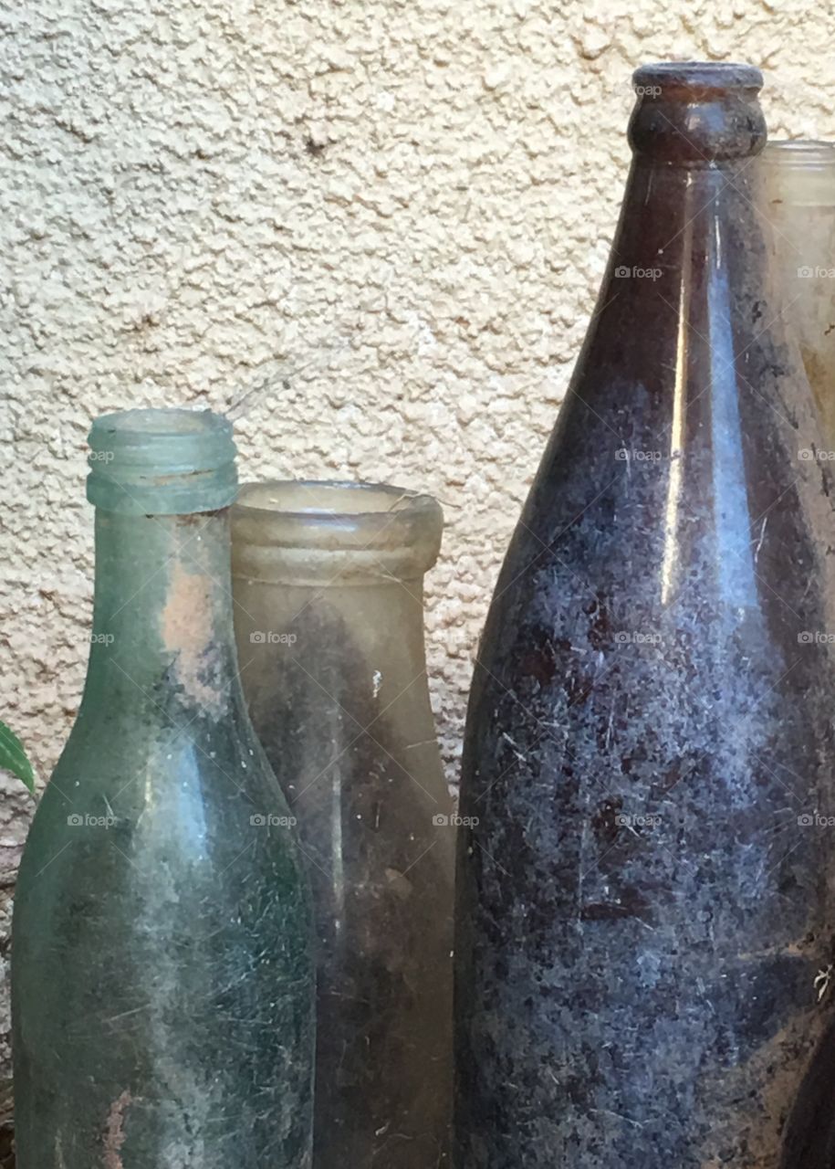 Perfect imperfections; collection vintage bottles dug up in the backyard