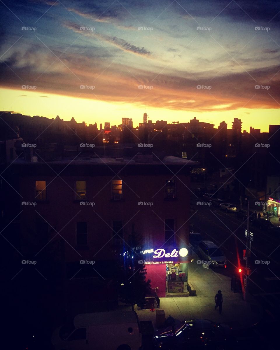 Rooftop sunset, view of Manhattan, corner Grand and Union avenues in Brooklyn, New York