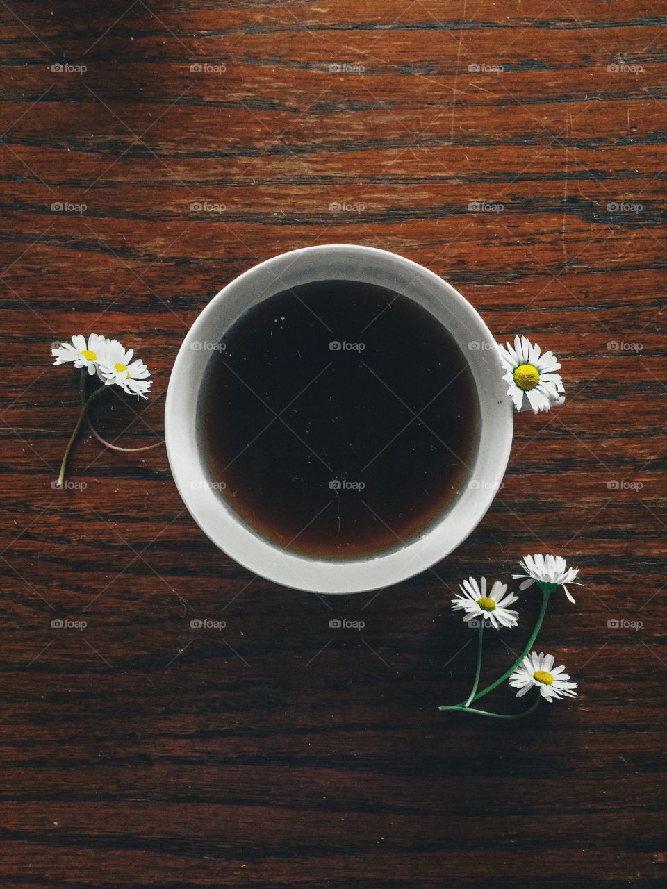 Coffee and daisies