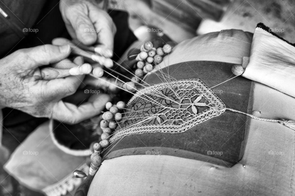 Woman doing traditional lace-making