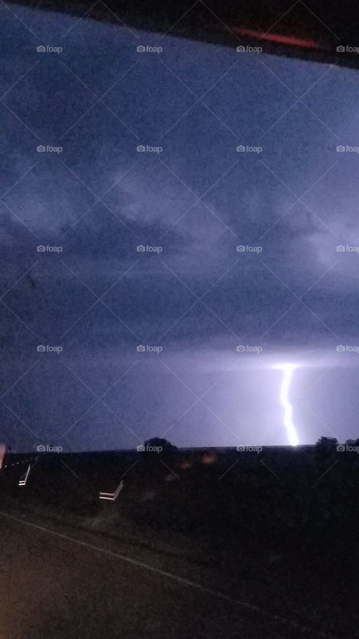 the lightning made the clouds look purple