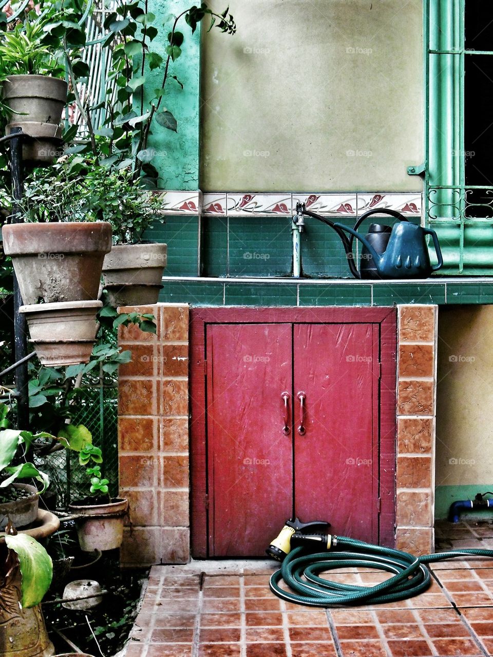 pocket garden with a water faucet and sink