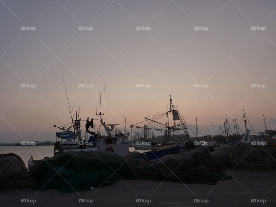 boats harbour masts evening-light by lizajones