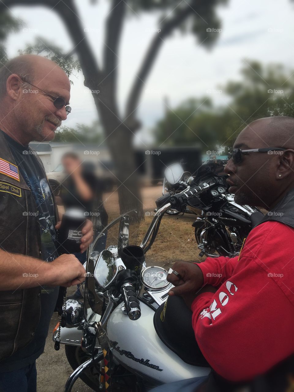 Combat veterans discussion. This is a photo of two combat veterans having a discussion over there motorcycle club the CVMA