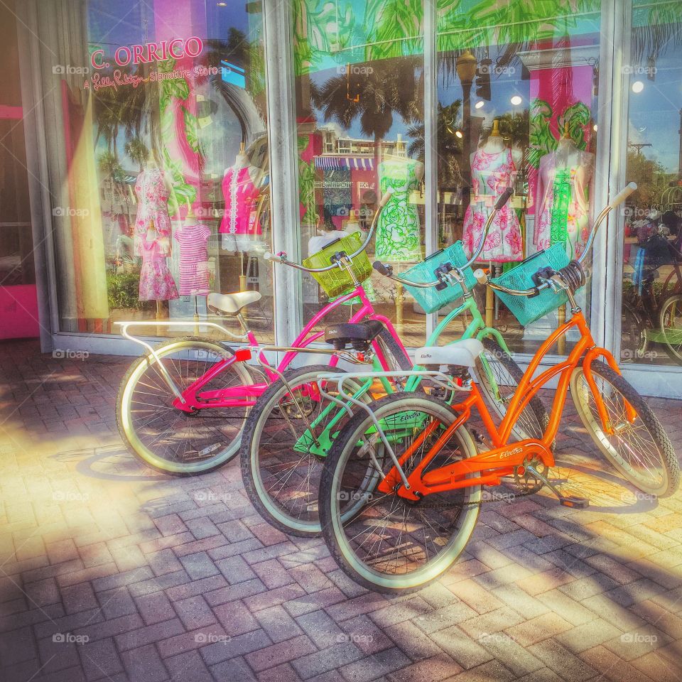 Tri-colored Transportation . Three brightly colored bicycles