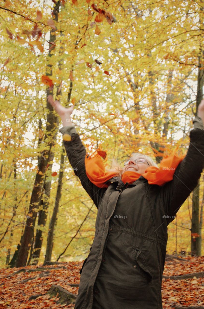 Happy woman in forest