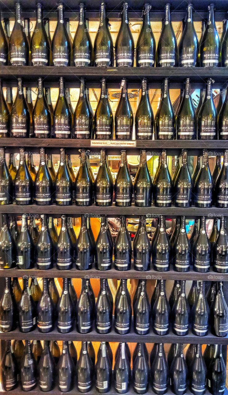 A Champagne shelf with many bottles
