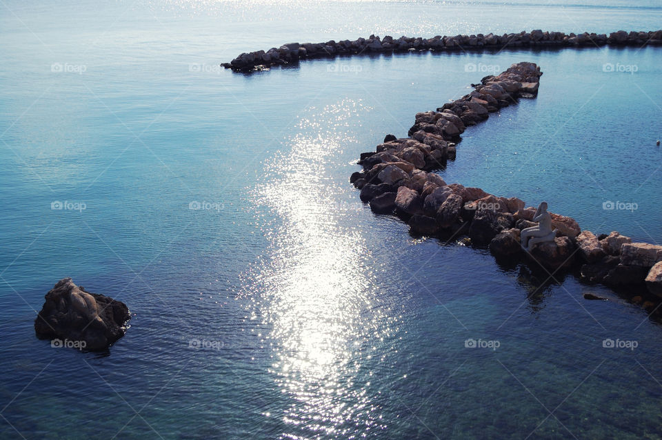 Rock pier in sea