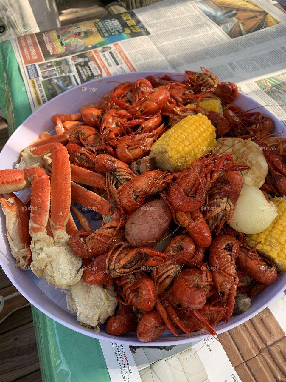 Feeding a crowd on my birthday with a Cajun-style crawfish boil, including shrimp and snow crab prepared outside over propane heat