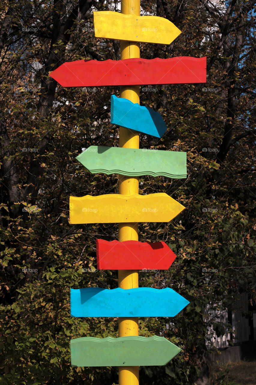 Colorful arrows signpost