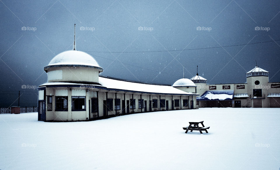 Hastings pier (pre 2010 fire) in the snow, UK