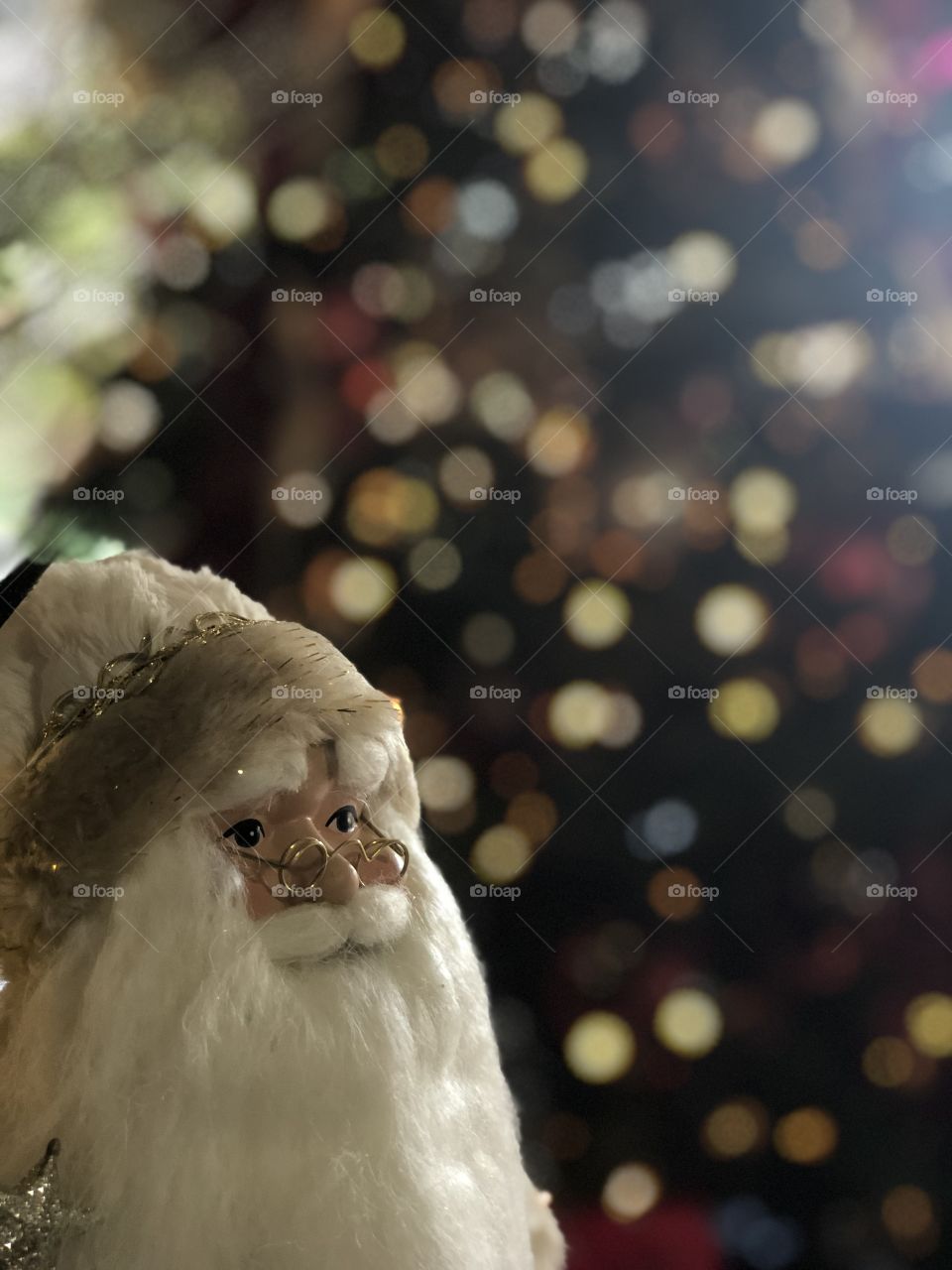 Foap Mission A Week Of Holiday Decor! Santa Claus In Front of The Christmas Tree With Blurred Lights In Backgrounder!