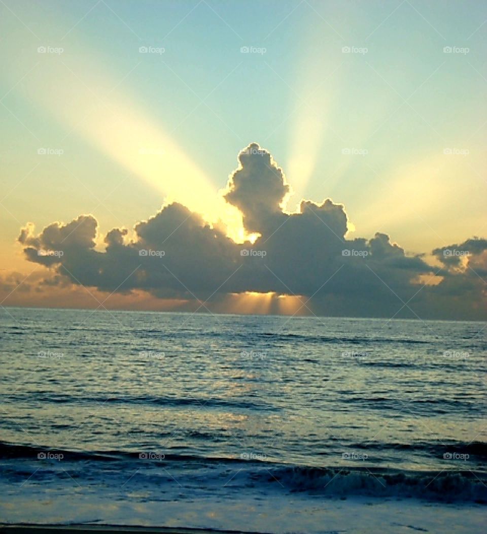 The sun rays behind a cloud looks spectacular