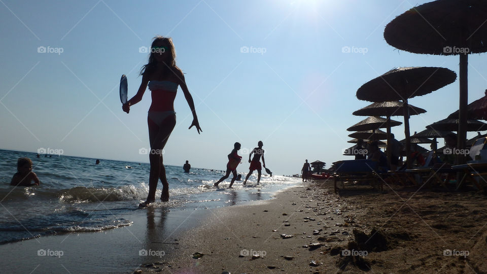 female silhouette on the beach