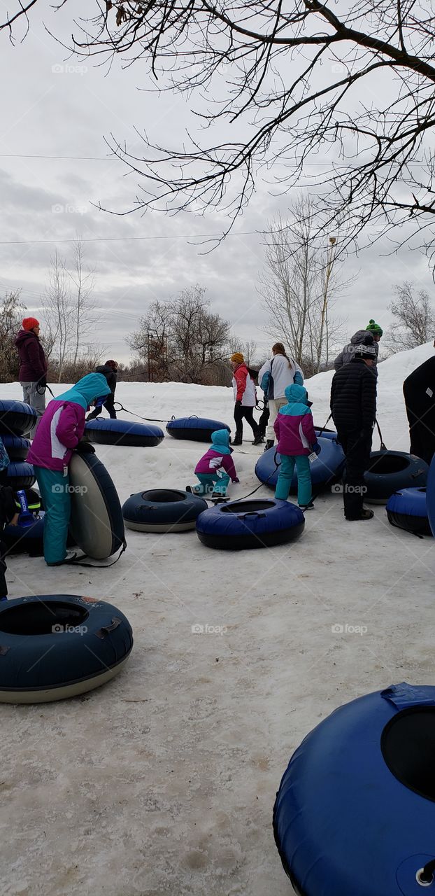 people playing in the snow